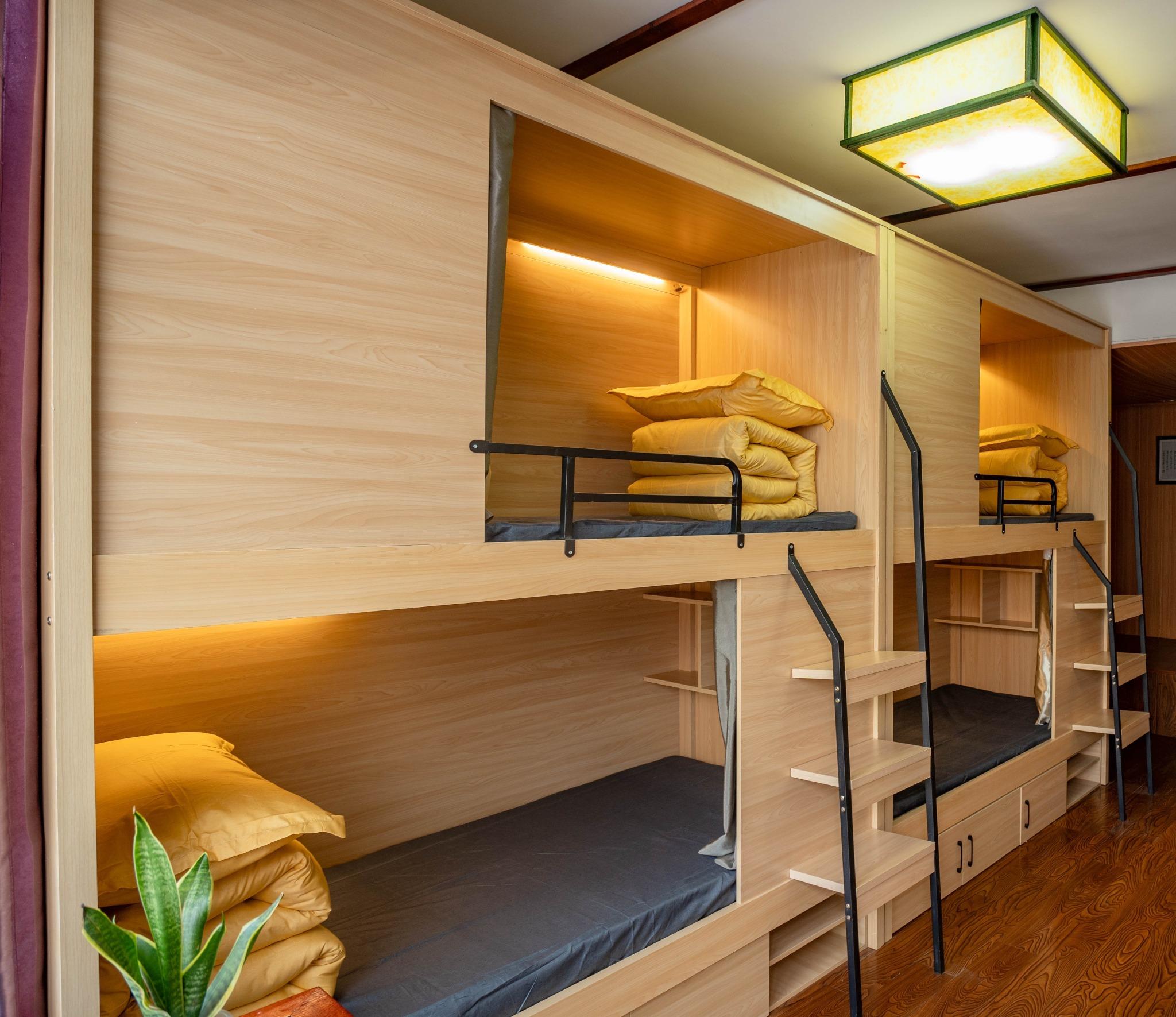 Light wood bunk beds with warm lighting
